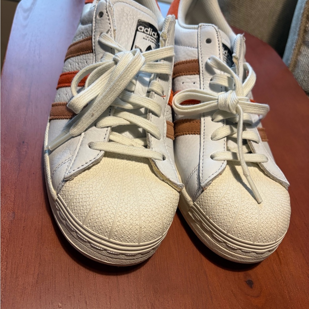 Adidas White Sneakers with Orange and Brown Accents
